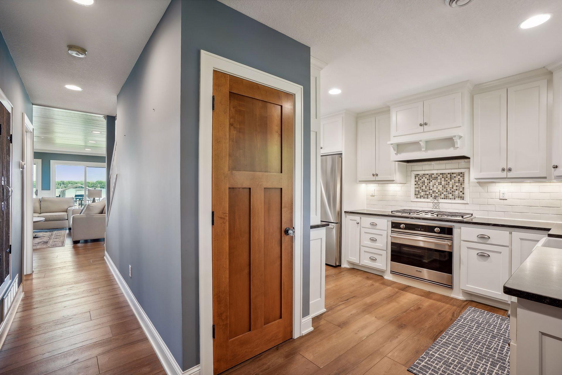 foyer area, door to lower level storage and mechanicals
