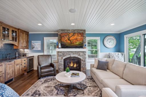 cozy stone fireplace, tongue and groove ceiling details