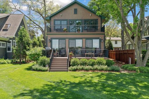 lakeside of home, 2 new composite decks and walls of windows for sunrise views