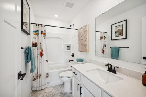 The finished lower level in this home gives you an additional bathroom