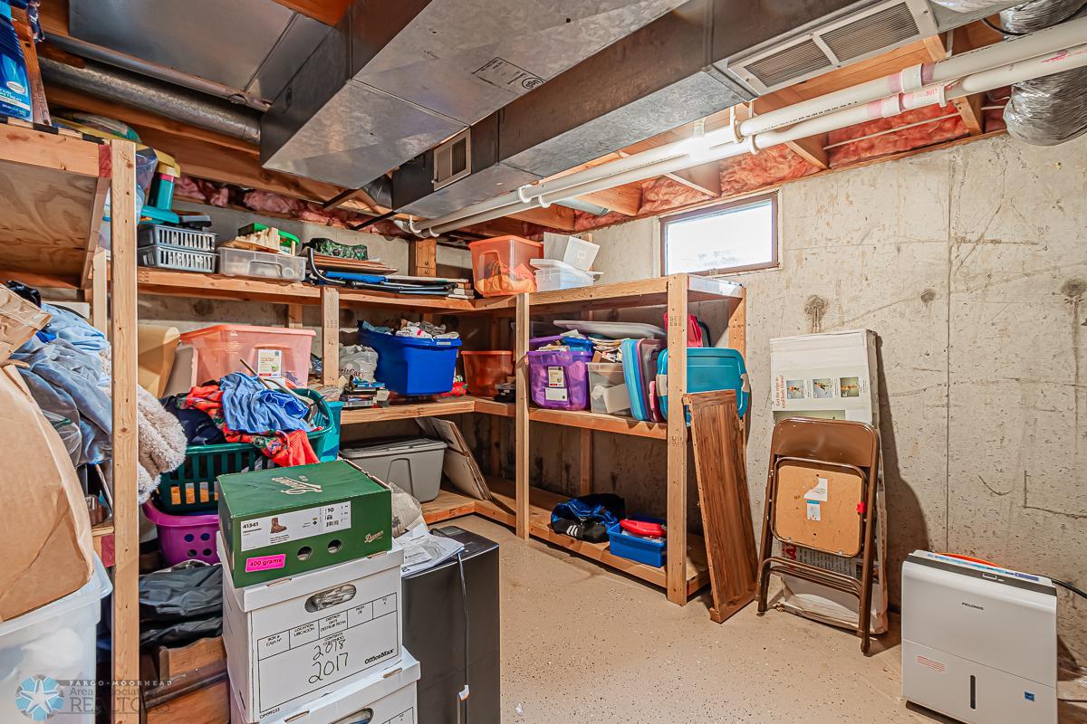 Lower Level Storage Room - Shelves remain