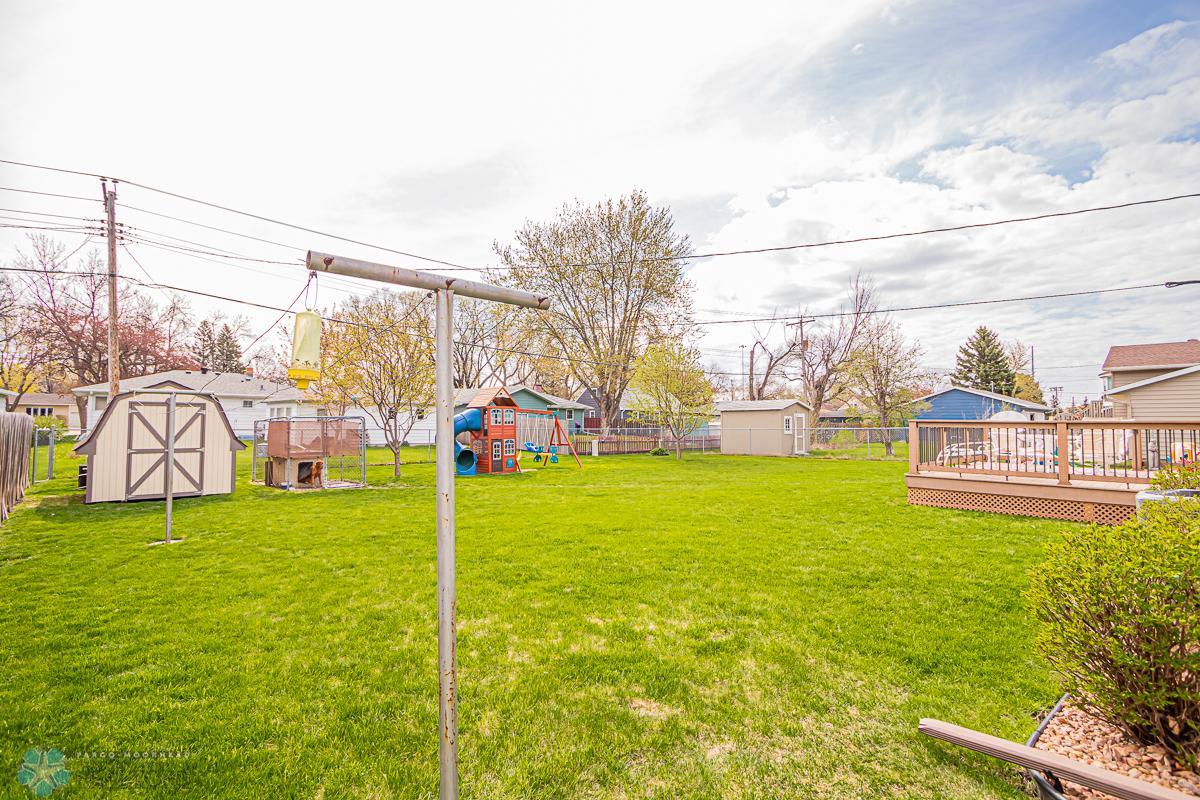 Large Back yard - shed, kennel and playset all remain