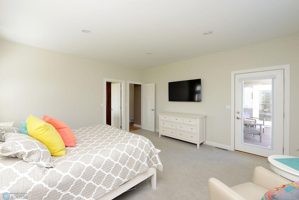 Owners' suite with walk-out to patio