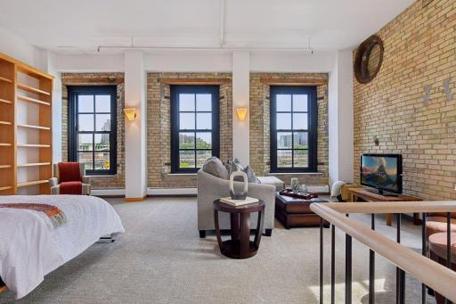 The guest loft overlooking the Mississippi River has multiple possibilities.