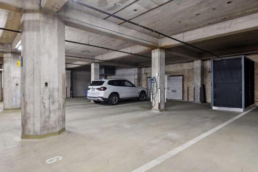 Notice the EV station in your 4-stall garage space. The storage unit stays.