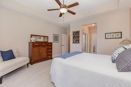 The master bedroom has ample closet space and a luxurious ensuite bath.