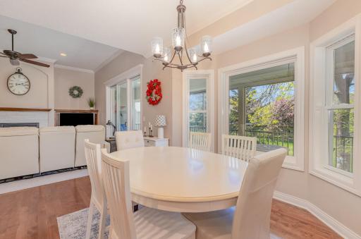 The adjoining dining area complements the home's aesthetic, offering a welcoming space for meals and gatherings.
