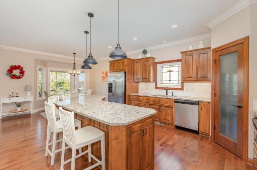 The kitchen, with its modern appliances, sleek countertops, and ample storage, blends effortlessly with the living area, creating a cohesive and functional space for cooking, dining, and relaxation.