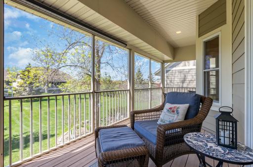 Enjoy the outdoors in comfort with a 3-season screen porch featuring maintenance-free decking. This versatile space allows you to savor the beauty of nature while staying protected from insects and the elements.