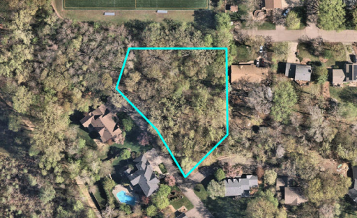 Perfectly sited on a quiet, private drive in the heart of Tamarack of Minnetonka, this 1+ acre lot is the perfect place to build your dream home!