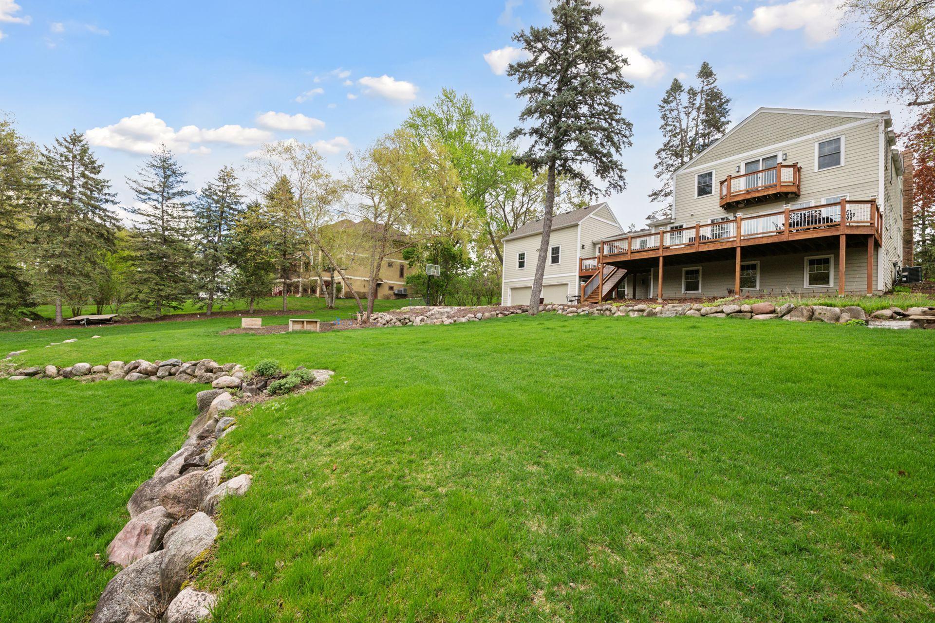 This home sets on an incredible 1.25 acre lot just 5 short minutes from downtown Wayzata.