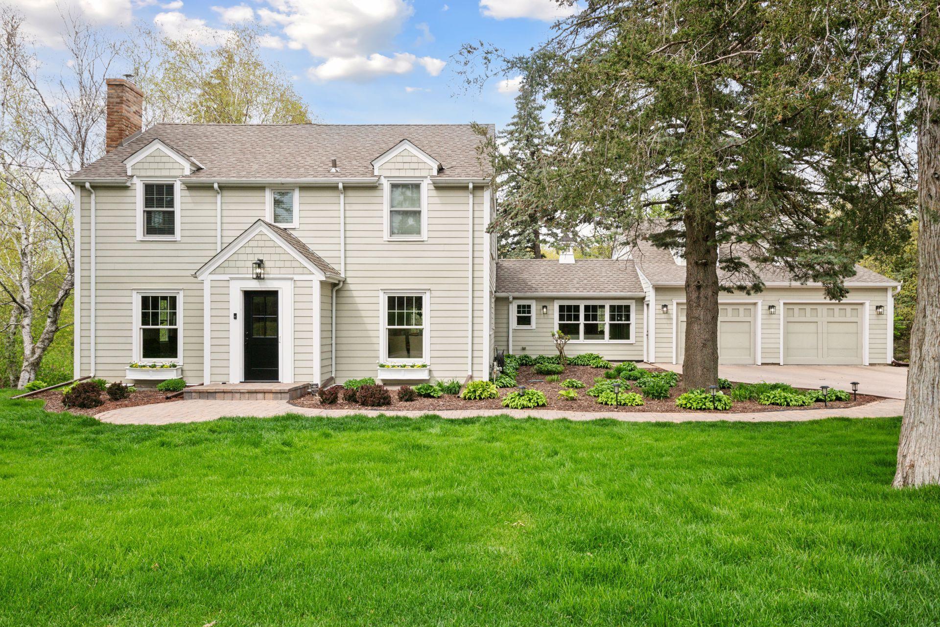 An incredible double lot surrounded by Lake Minnetonka and 5 minutes from Downtown Wayzata