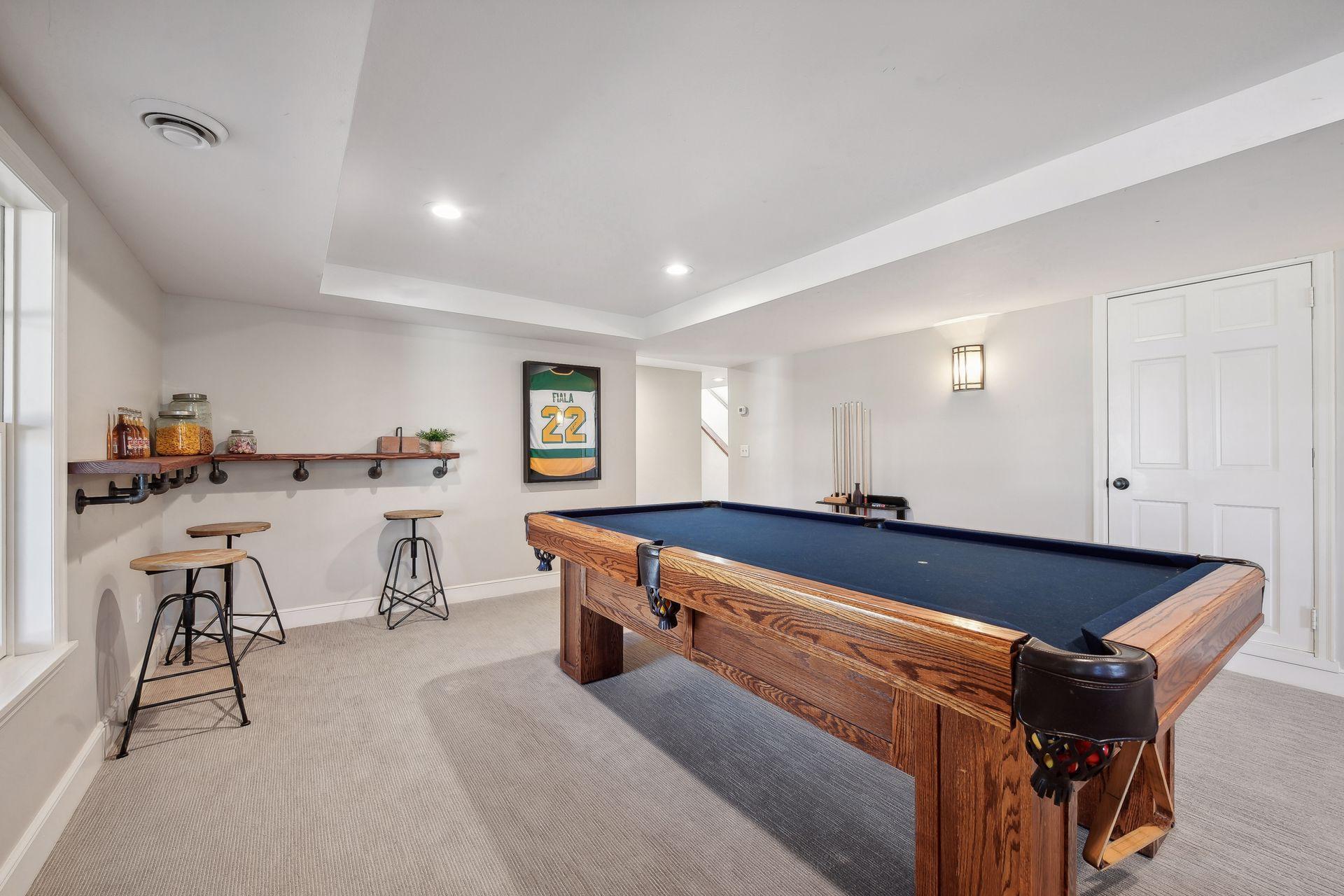 Lower level rec space is perfect for entertaining.