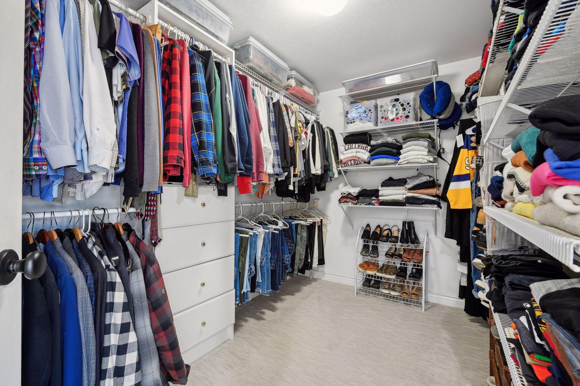 Expansive walk-in closet in the primary bedroom.
