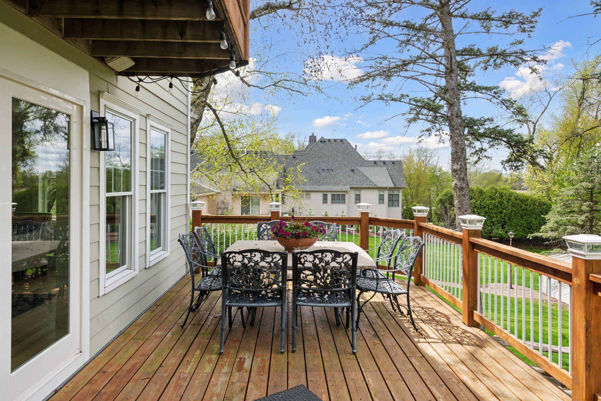 This beautiful expansive deck runs the length of the home taking advantage of the 1.25 acre private lot.
