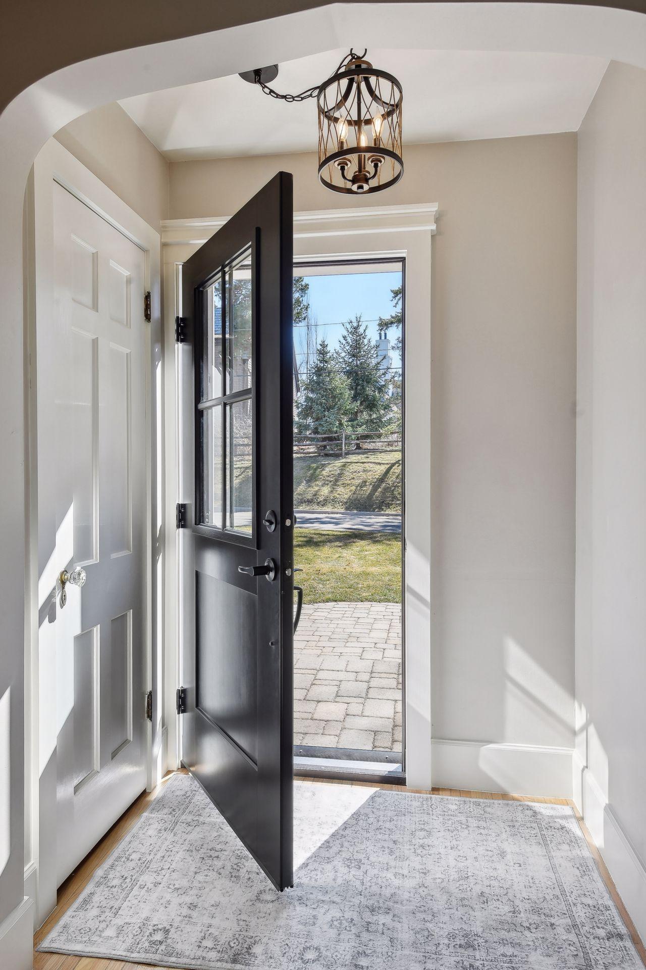 As you walk through this sunny portico, natural light surrounds you.
