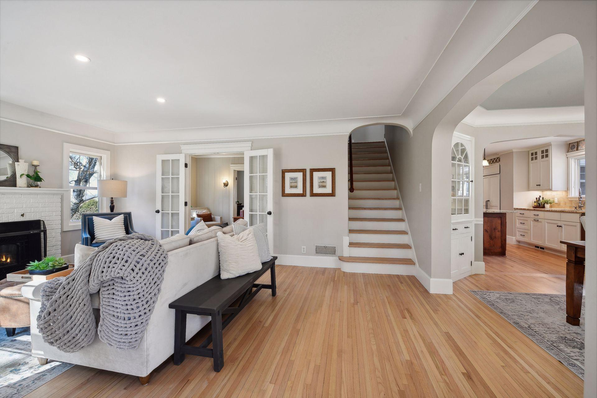 The foyer opens to a center hall design with the living space off to the left and the dining area to the right. The design and Flow are exceptional.