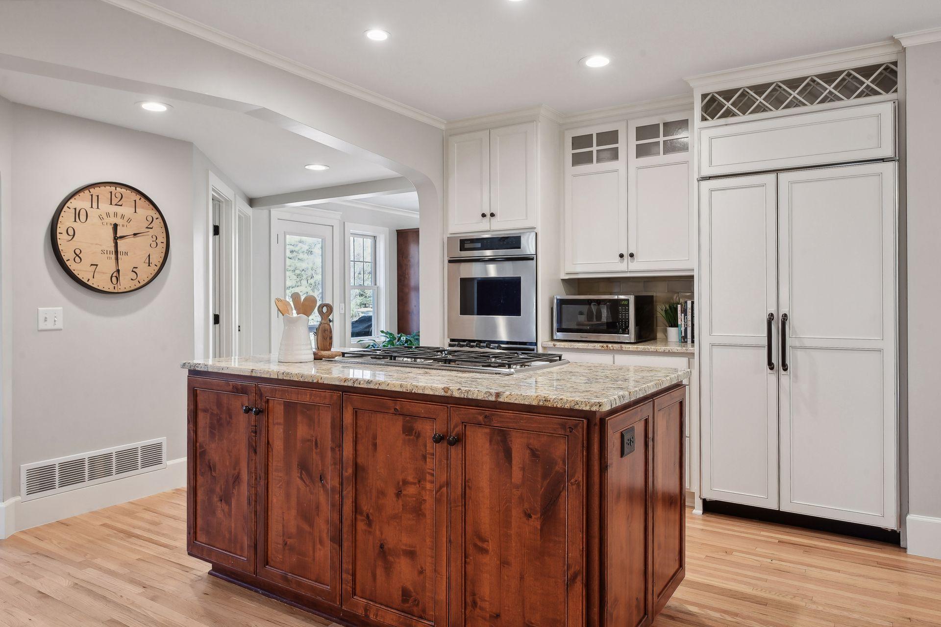 The SECOND side by side island offers the perfect chef's triangle for preparation and cooking!