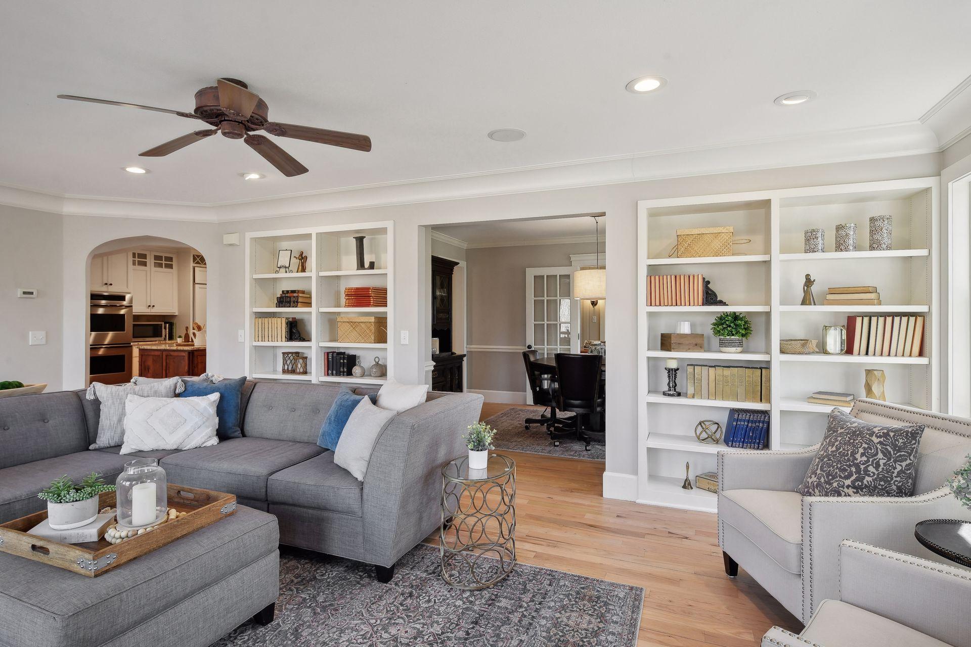 Floor to ceiling bookshelves and newly finished lighting, paint and fixture wrap you with a hug in this glorious space.