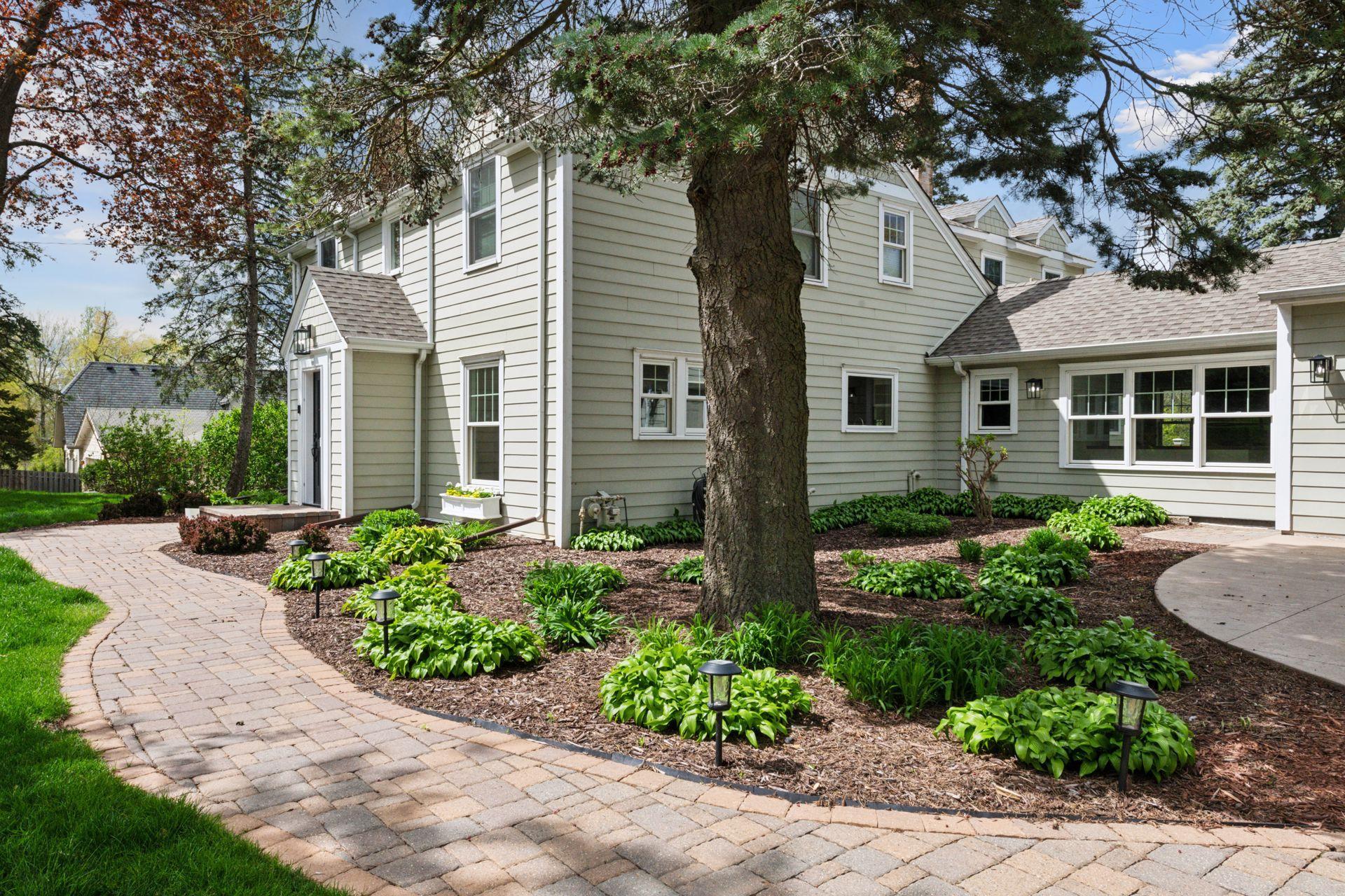 Extraordinary acreage with incredible professional landscaping