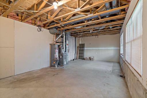 Unfinished basement ready. Newer furnace and air conditioning unit.r your personal touches