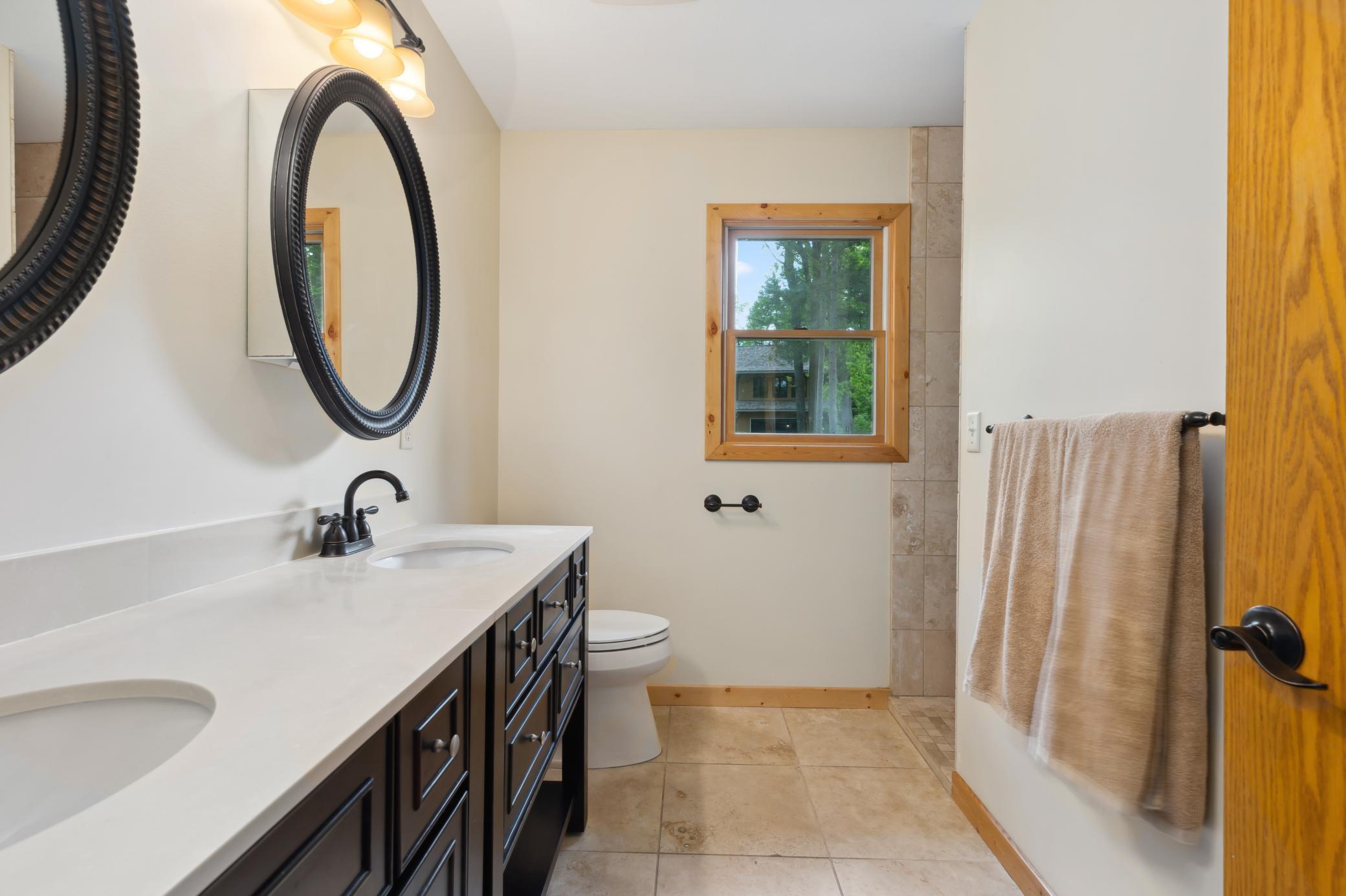 updated bathroom with double sinks
