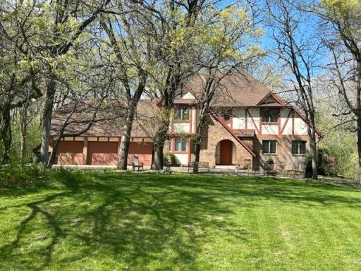 Enchanting Tudor Home on 2.5 private acres
