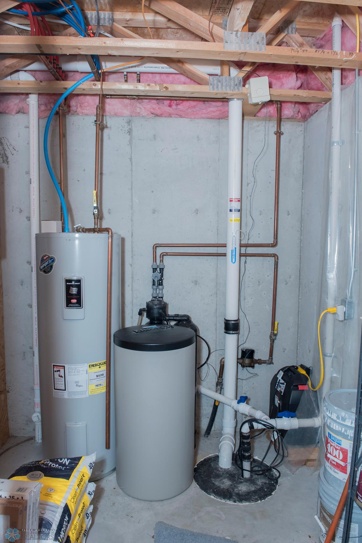 Utility room/water softener, heater, and radon mitigation system