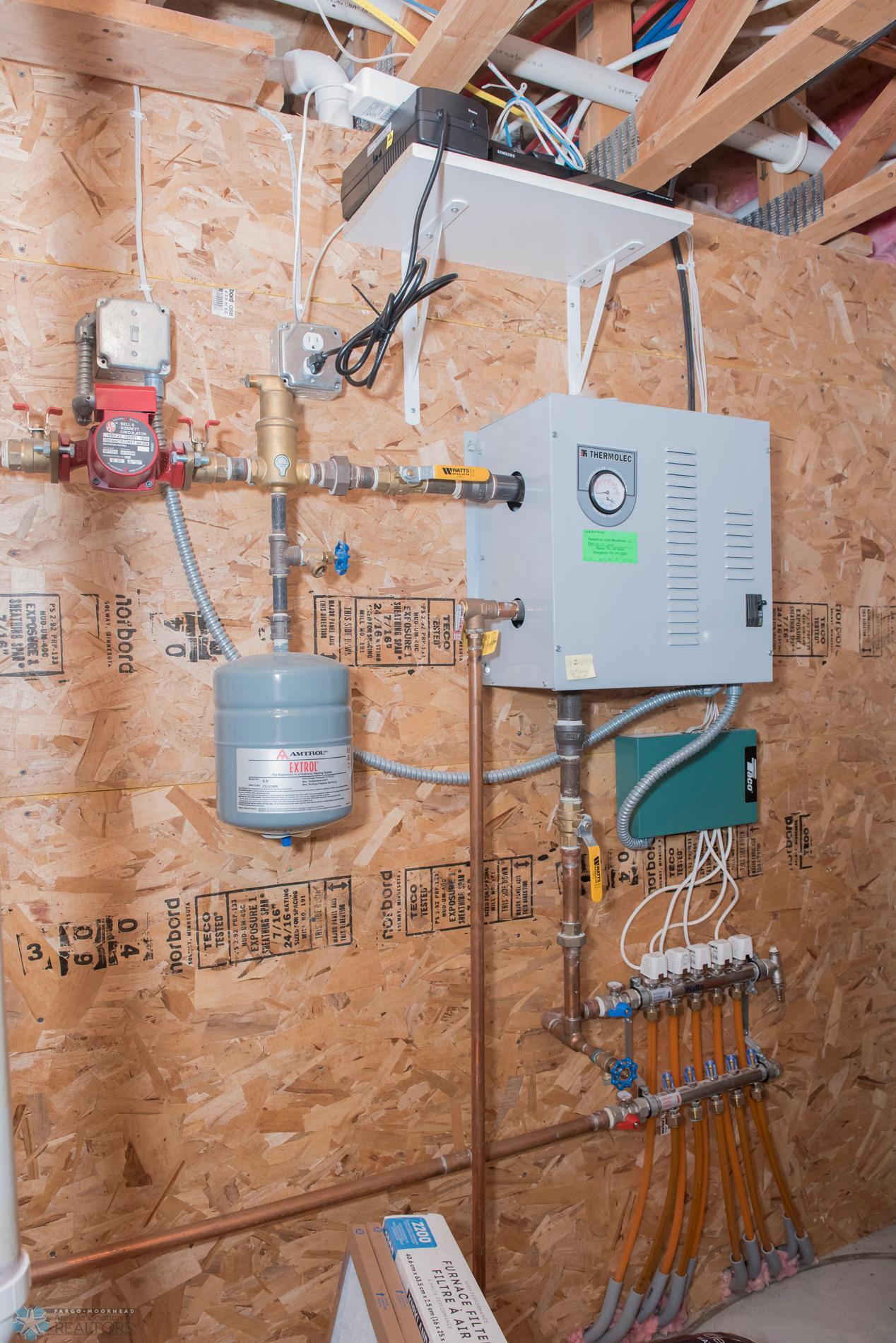 Boiler for in-floor heat in basement