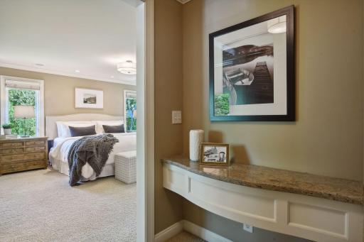 Private primary suite at the end of the hallway