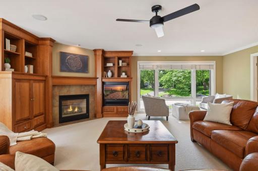 Cozy family room with beautiful built-ins and custom gas fireplace