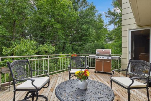 Deck off of kitchen with souther exposure