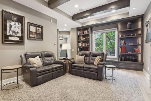 Floor-to-ceiling book shelves hold your collections