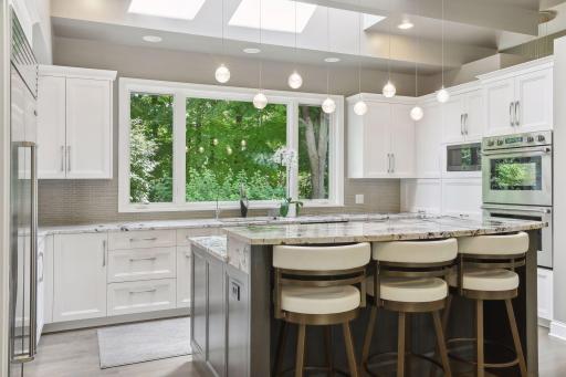 Large windows with expansive bring the outdoors in