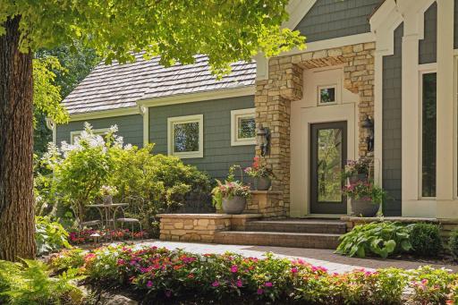 The grand entrance is matched by the beautiful flowers