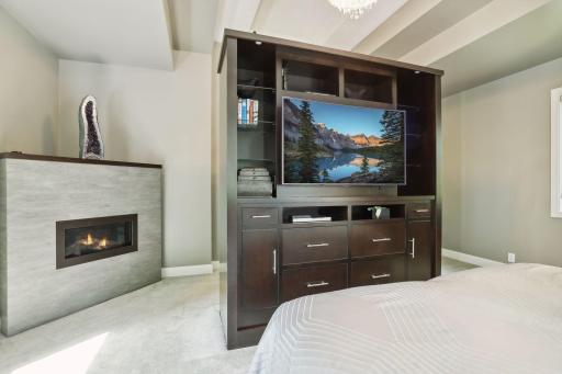Enjoy TV & a fire from the comfort of your bed