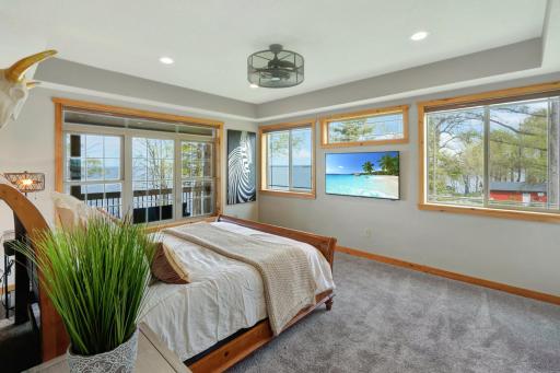Primary bedroom with panoramic lake views