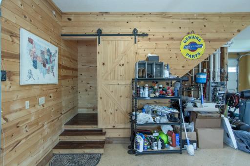 Barn door leads to finished guest suite over garage