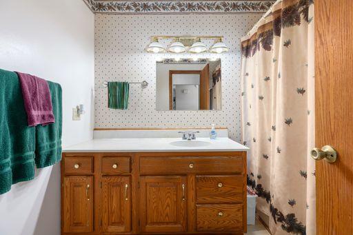 Discover the convenience of a full bathroom on the main level. Perfect for guests or if you simply prefer to avoid stairs, this bathroom is a valuable addition to any home.