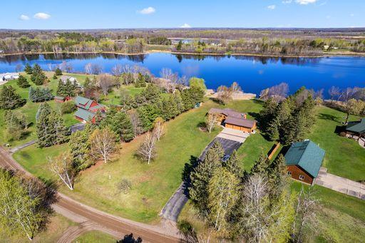 Escape to this stunning home nestled beside a serene private lake, solely available to residents. Take advantage of the opportunity to fish and immerse yourself in the tranquility of nature.
