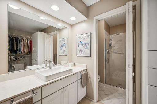 Remodeled Ensuite bath w/walk in shower and adjoining walk in closet.