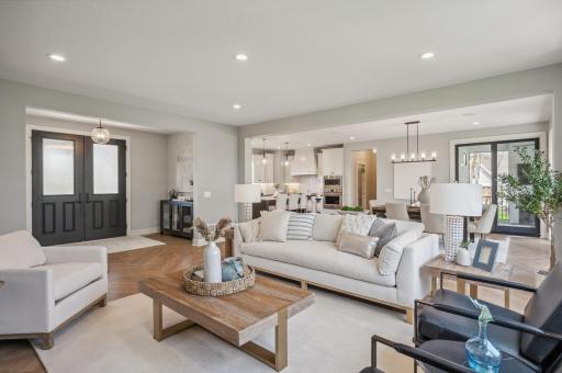 Photo for 3722 Woodland Cove Parkway, Minnetrista, MN 55331 - Listing #6533987 Large windows invite the beauty of the backyard indoors, creating a serene ambiance for everyday living.