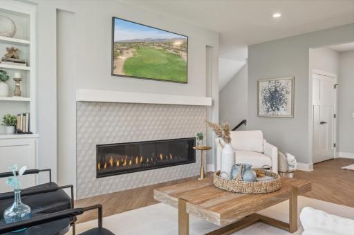 Photo for 3722 Woodland Cove Parkway, Minnetrista, MN 55331 - Listing #6533987 Relax by the warmth of the gas-burning fireplace in the spacious living room.