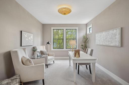 Photo for 3722 Woodland Cove Parkway, Minnetrista, MN 55331 - Listing #6533987 The main level versatile den provides a perfect space for an office or reading nook with French doors.