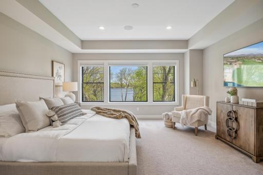 Photo for 3722 Woodland Cove Parkway, Minnetrista, MN 55331 - Listing #6533987 Ascend to the upper level to discover the primary suite, boasting a 9-foot tray ceiling, and stunning backyard views.