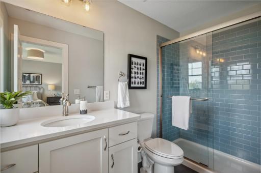 Photo for 3722 Woodland Cove Parkway, Minnetrista, MN 55331 - Listing #6533987 Stunning three-quarter ensuite with a tiled walk-in shower.