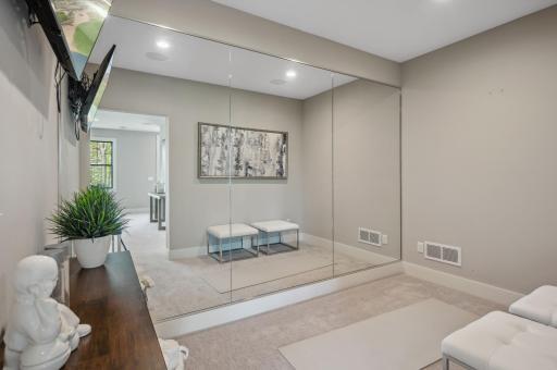 Photo for 3722 Woodland Cove Parkway, Minnetrista, MN 55331 - Listing #6533987 Adjoining workout nook, a dedicated space designed to elevate your fitness journey.
