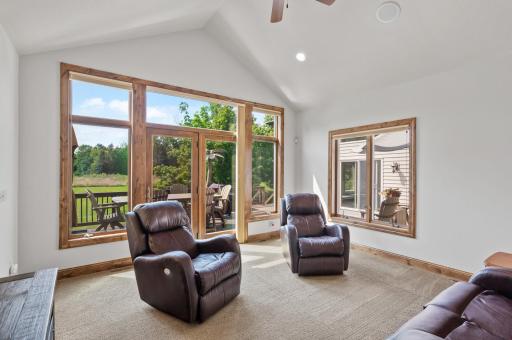 Relax in the sunroom right off the kitchen
