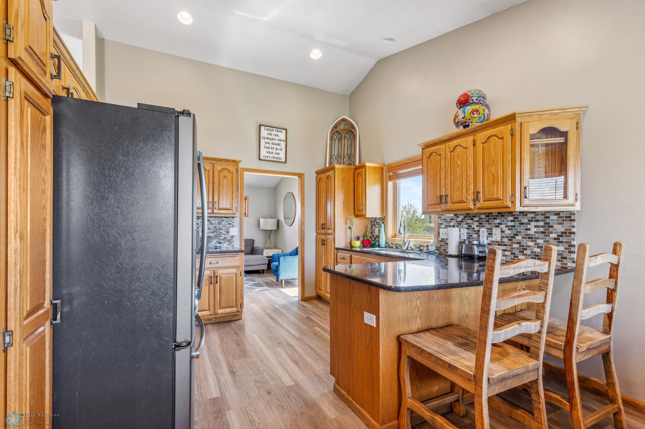 Kitchen with access to living room.