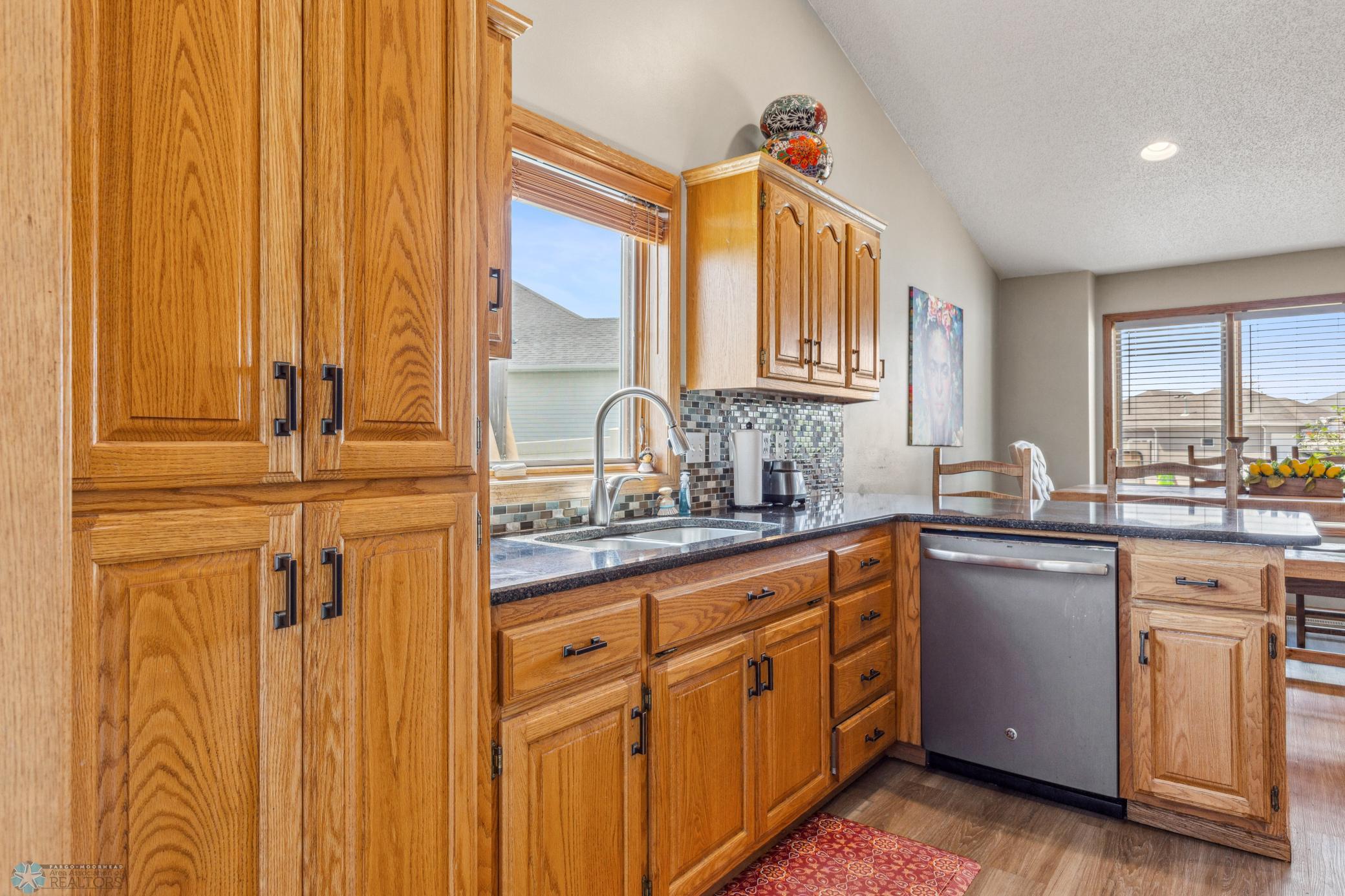 Great Kitchen with a window with lots of l natural light.
